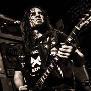 Scott Roby destroying the guitar with 21st Century Goliath!